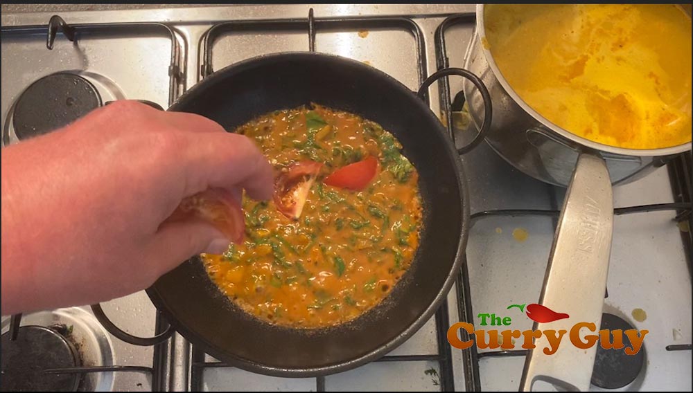 Stir in the tomatoes