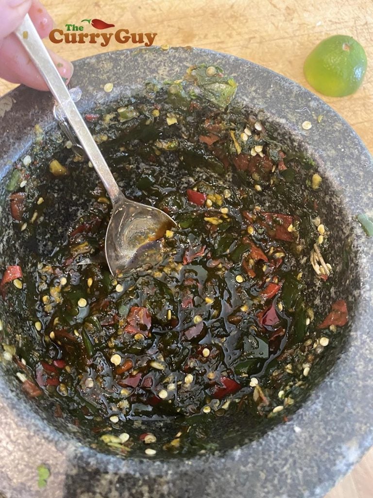 Adding fish sauce and oyster sauce