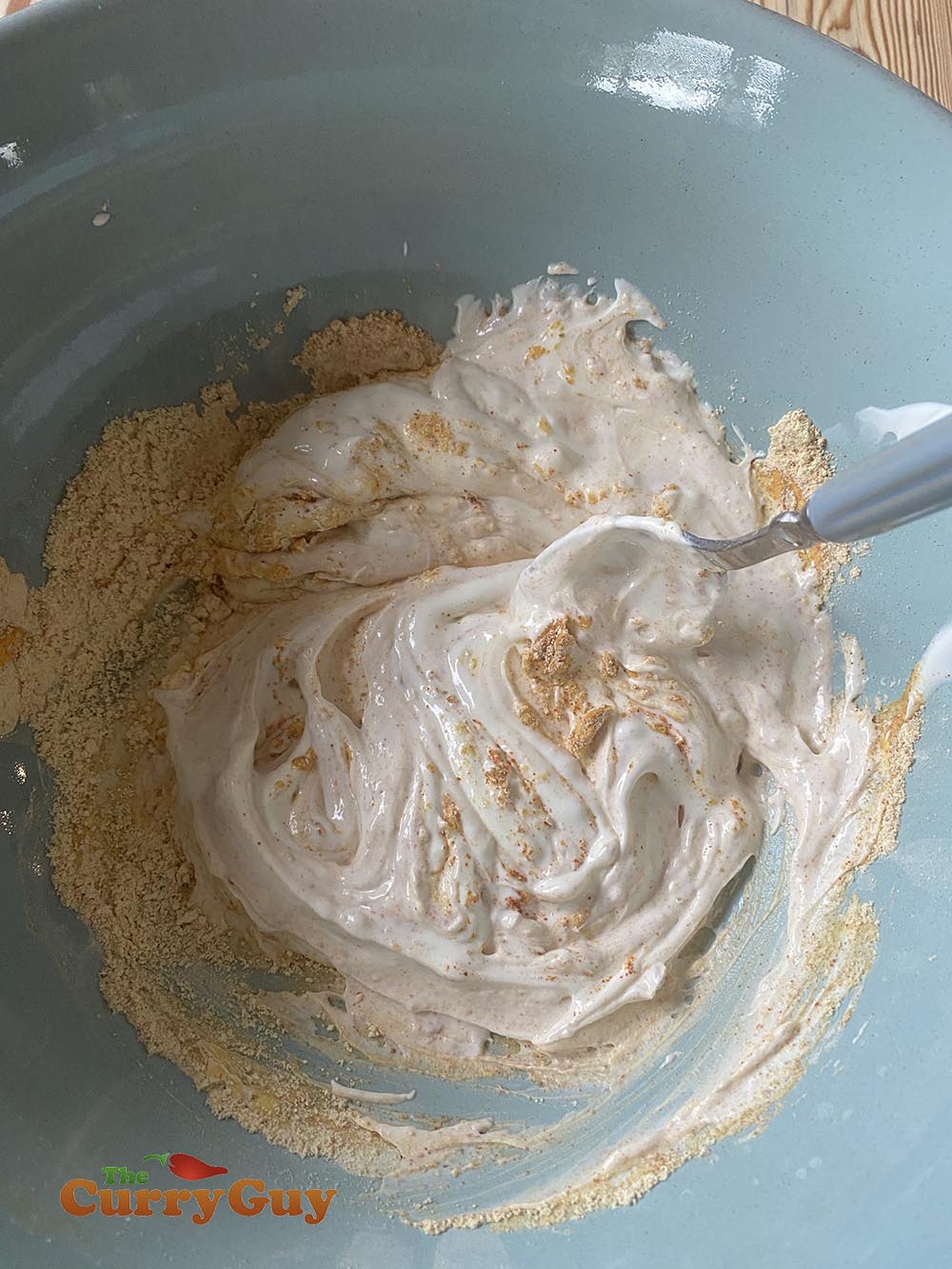 stirring flour mixture into the yoghurt
