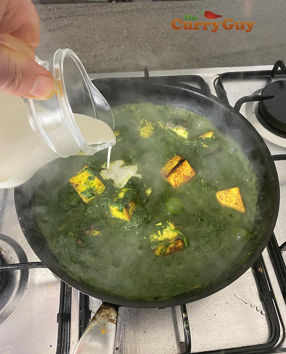 Adding cream to the pan