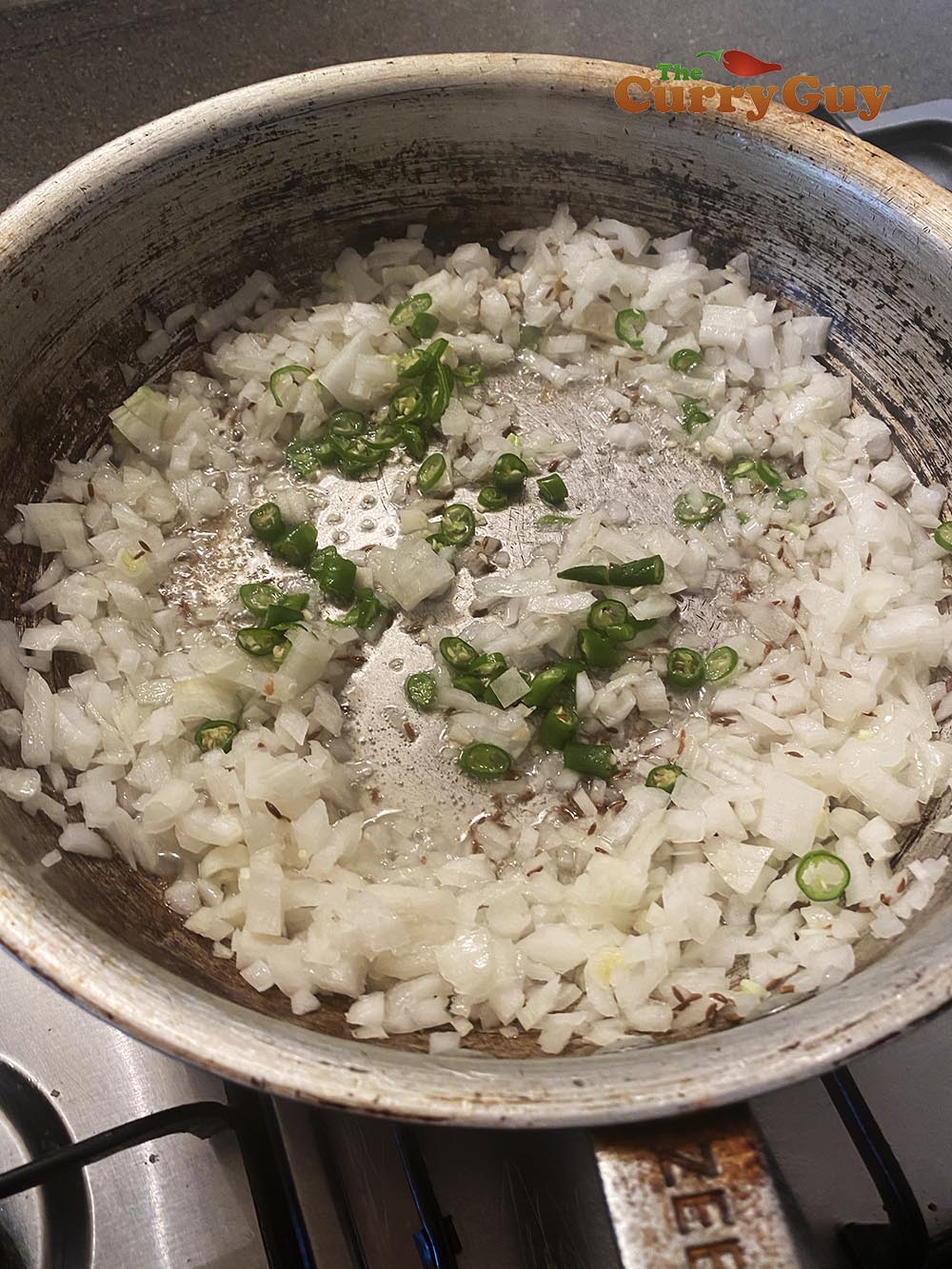 Frying onions and chillies