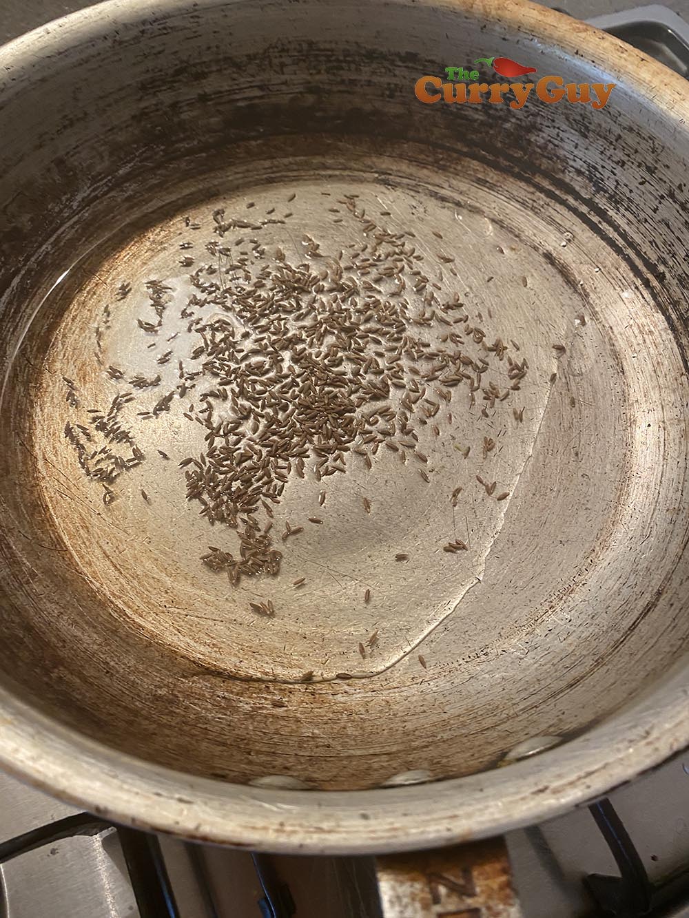 Infuse the cumin seeds into the oil for about 30 seconds. 