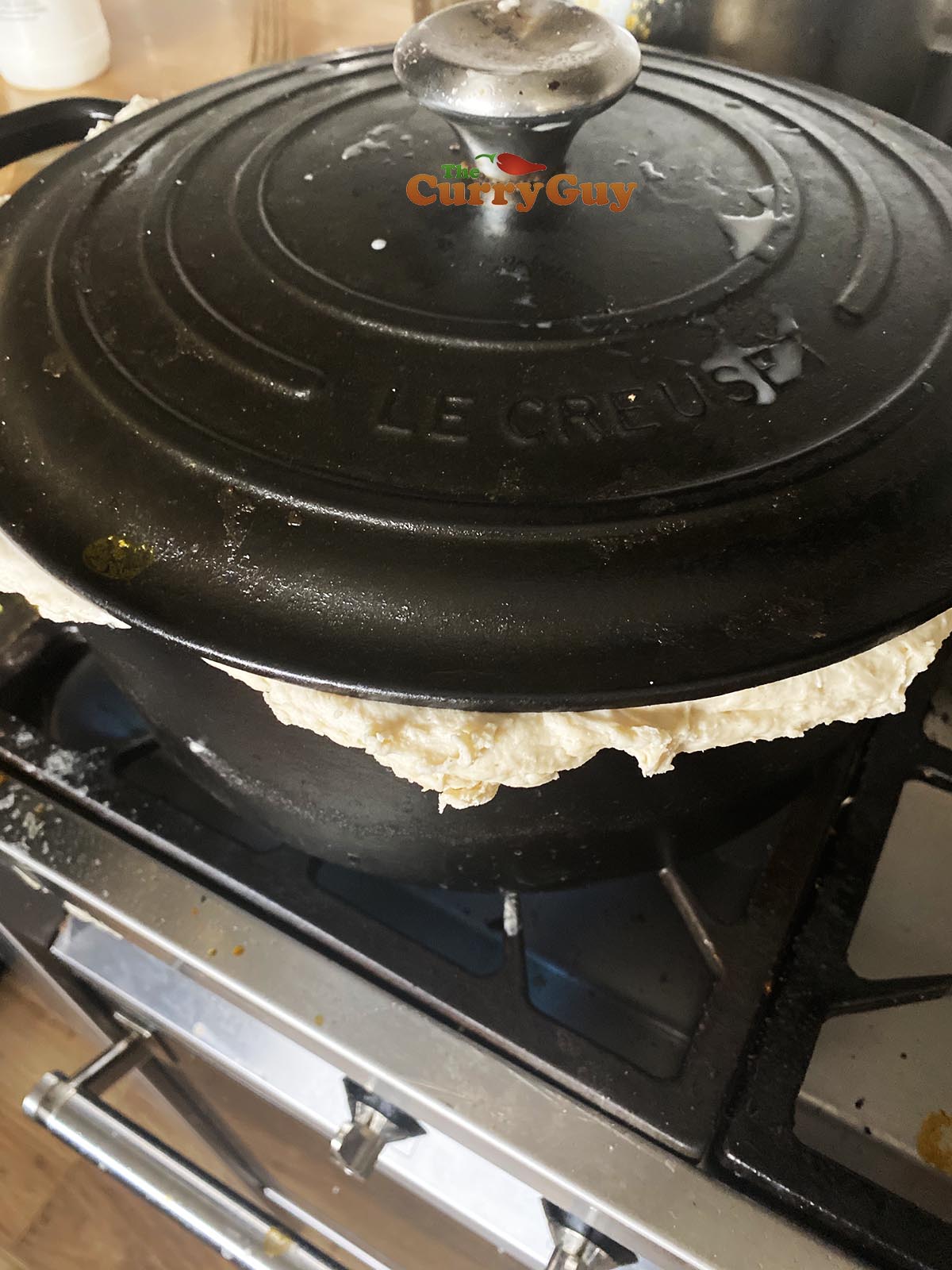 Covering pan to cook.