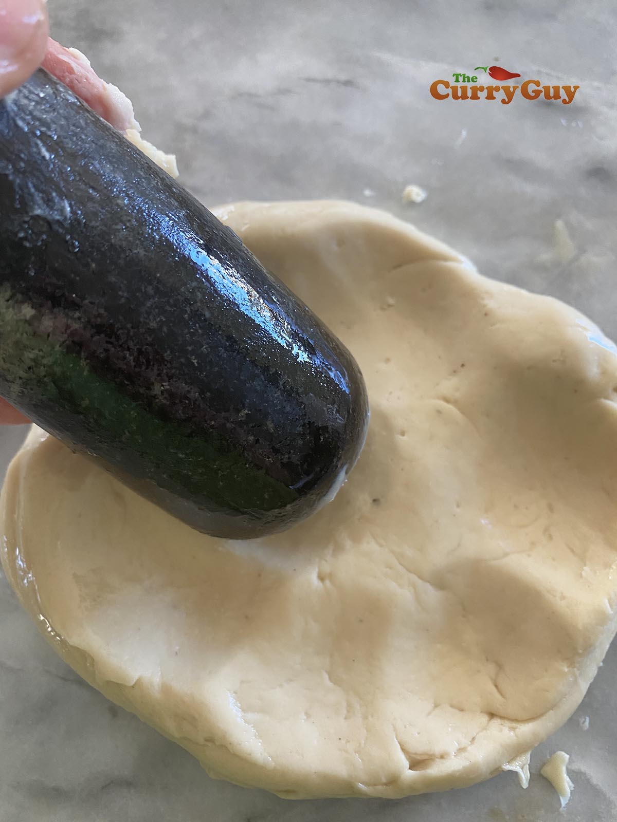 pounding papad dough