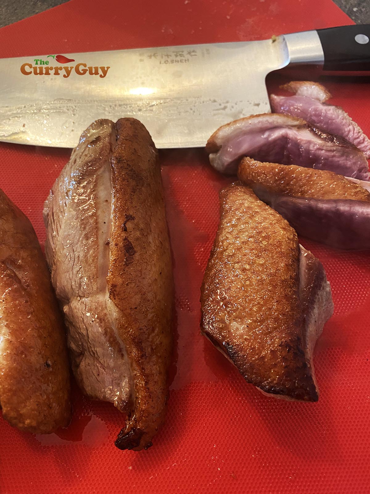 Slicing duck breasts.
