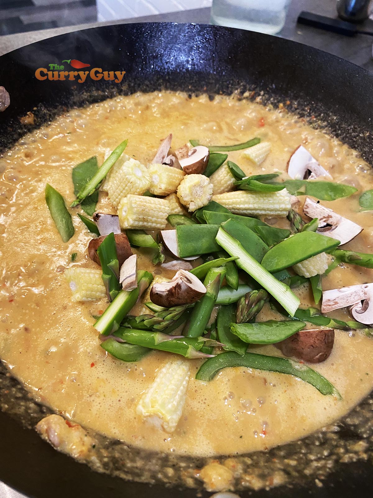 Adding vegetables to the pan