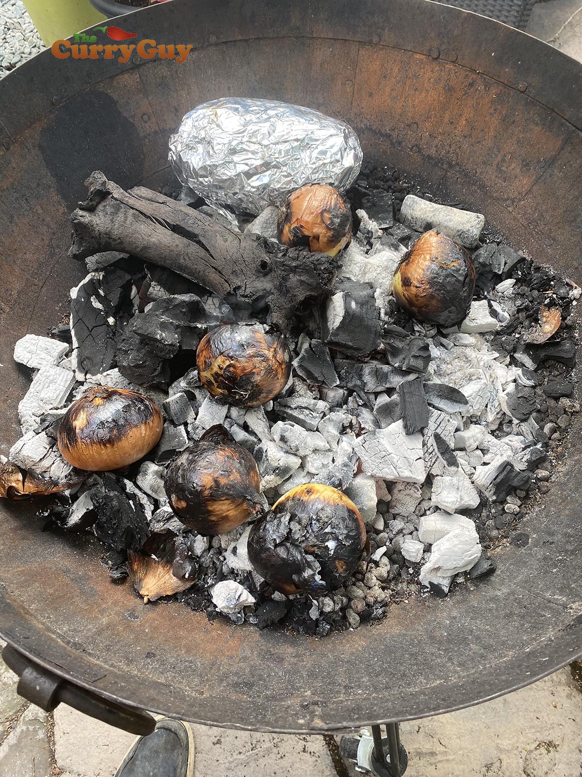 hobo pack of vegetables in the embers