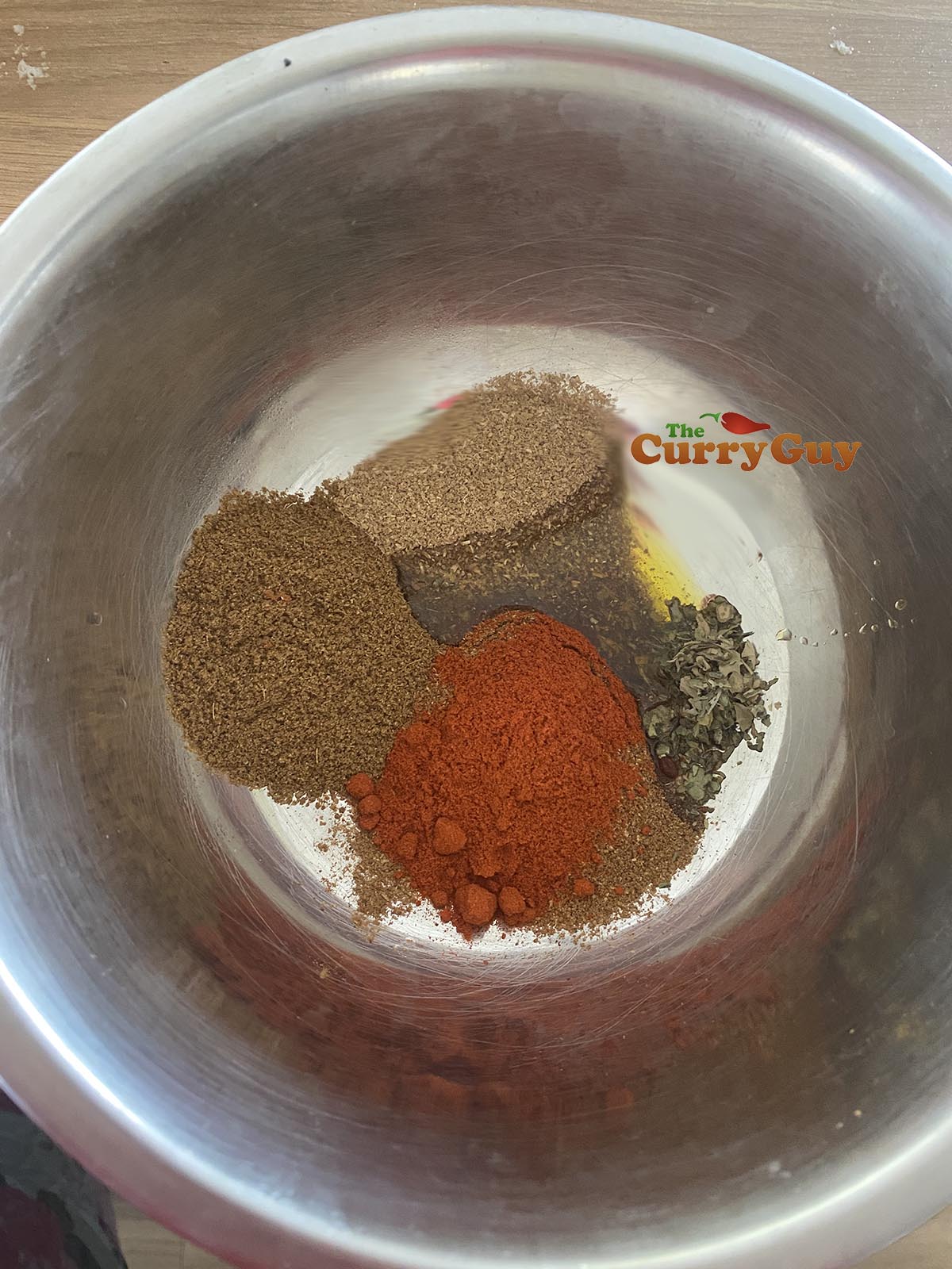 Making lamb tikka with spices