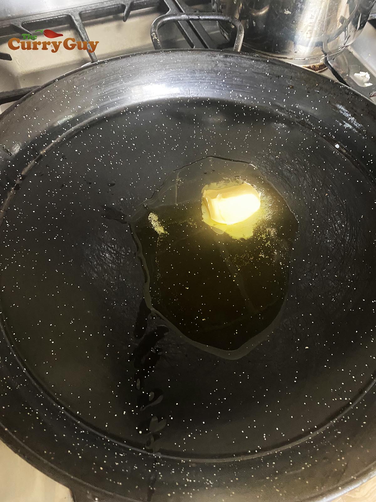 Melting half of the butter in a pan.