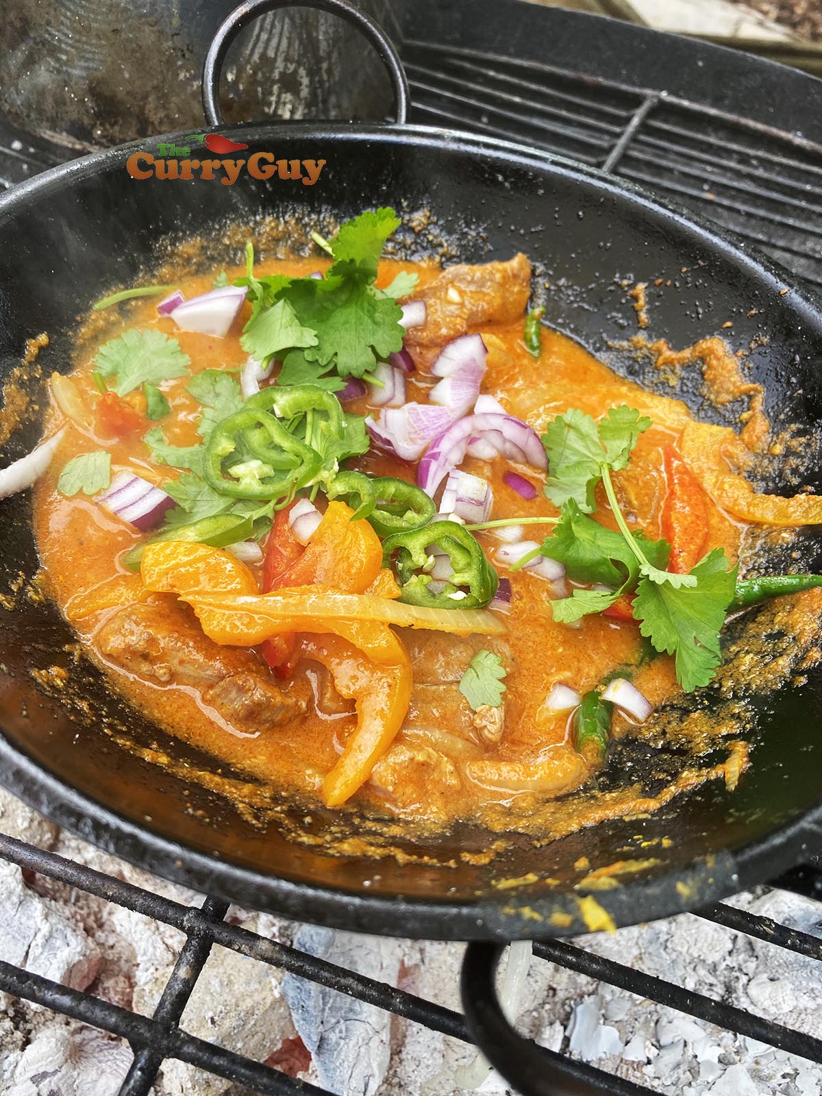 Garnishing with red onion and coriander