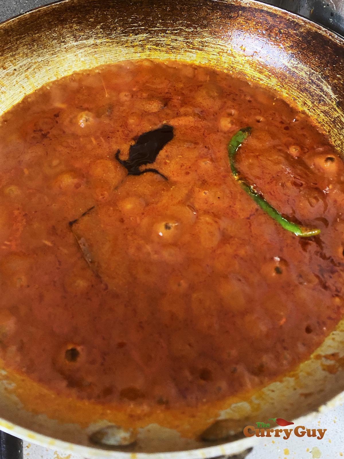 Adding remaining ingredients to pan