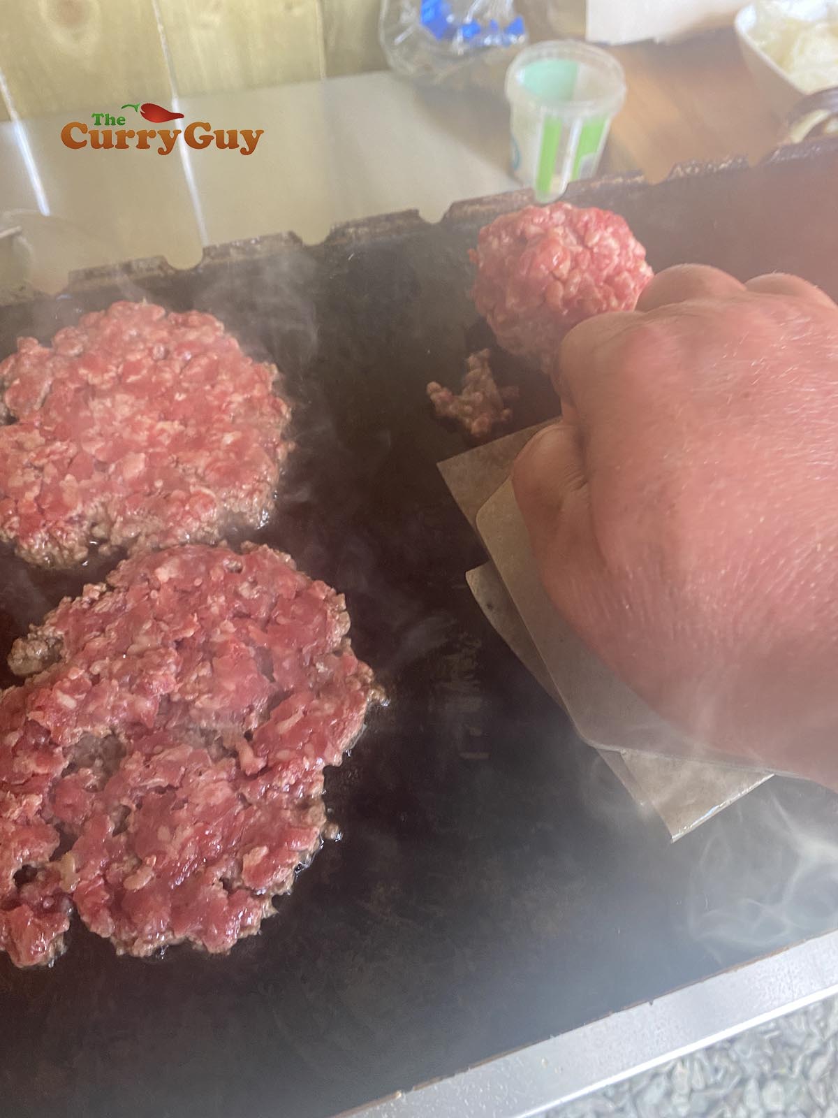 Pressing burgers