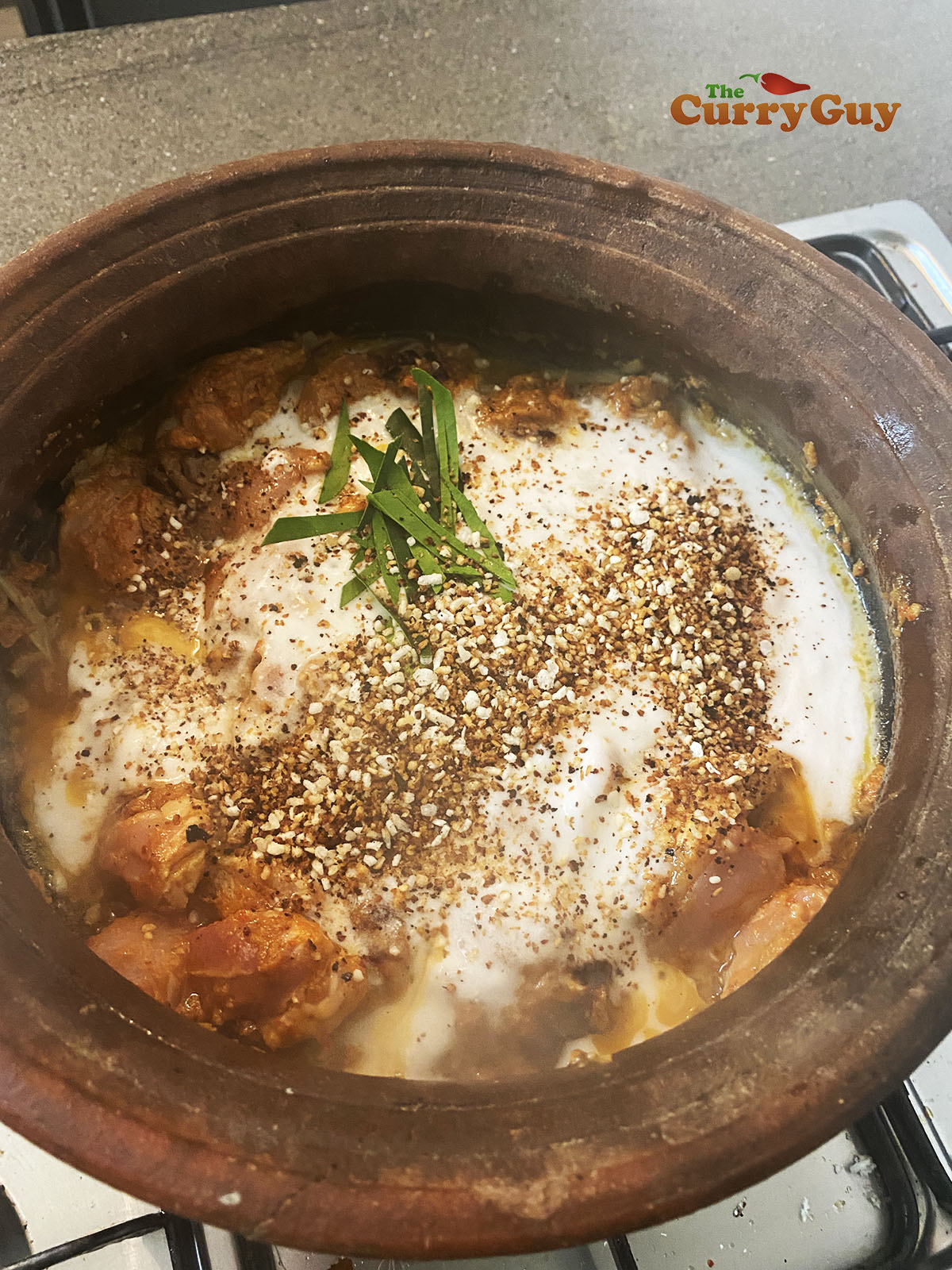 Adding remaining ingredients to pot