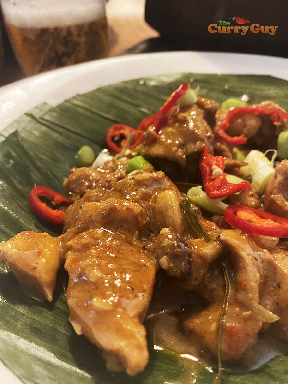 Chicken rendang on banana leaf