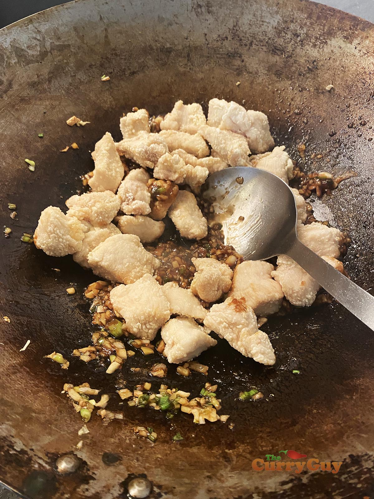 frying sesame chicken