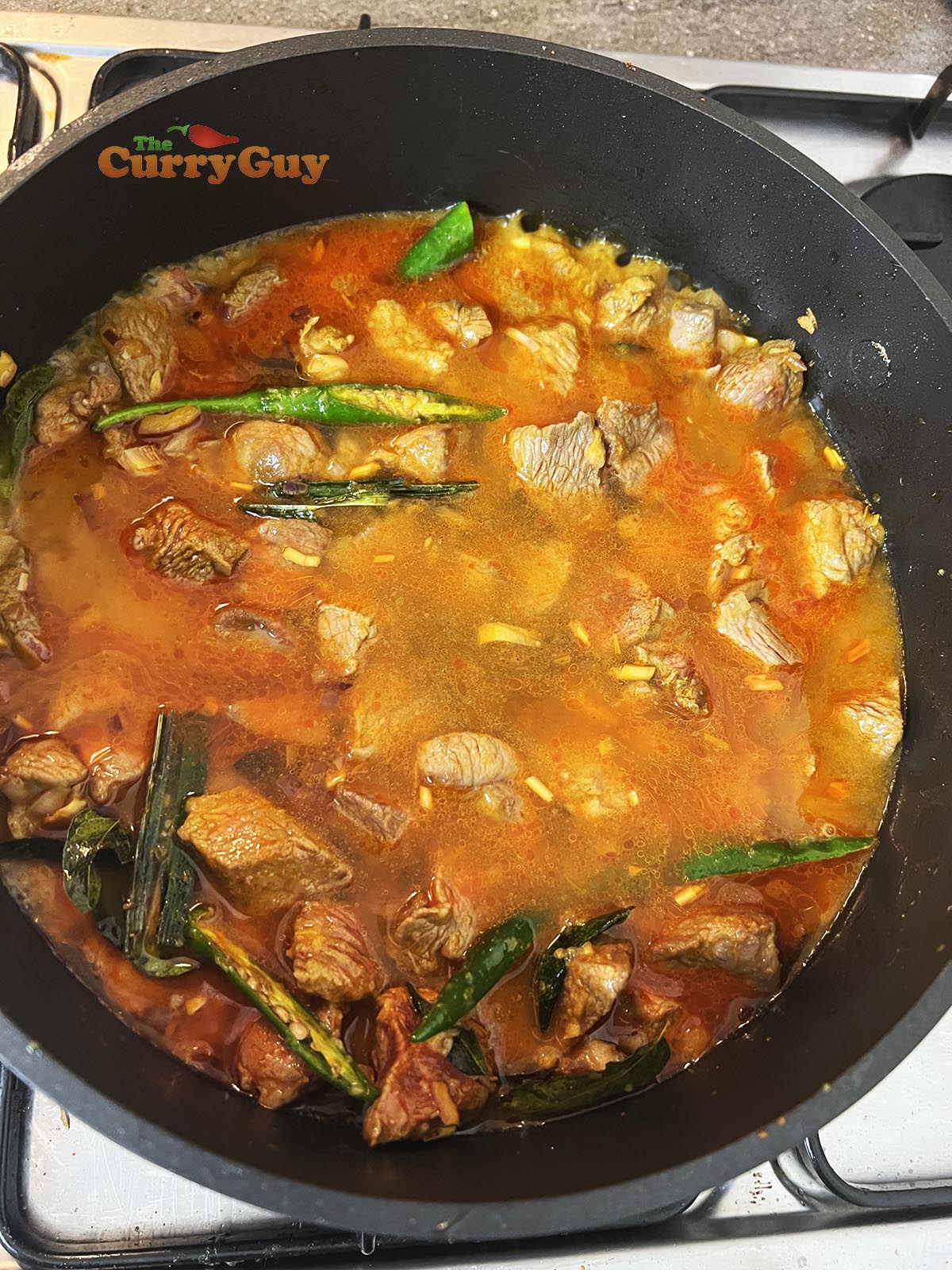 Topping the curry with water