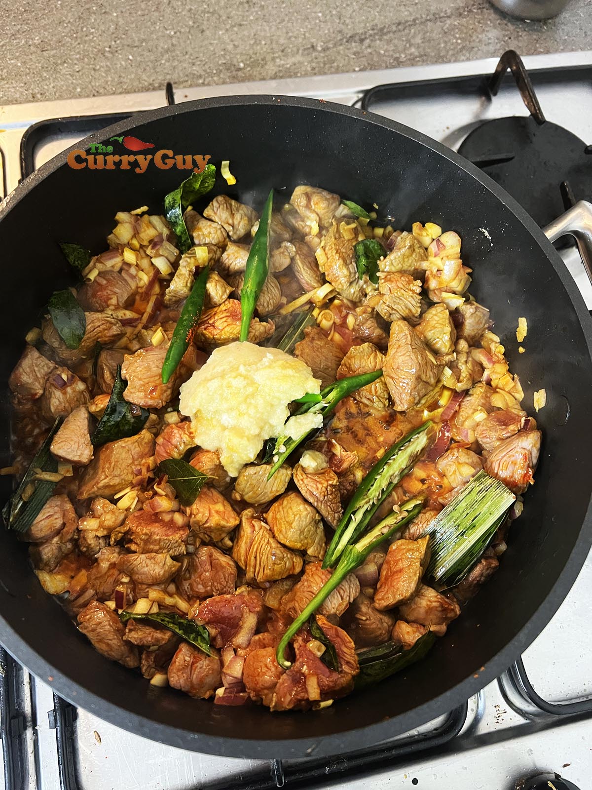 Adding chillies and garlic and ginger paste