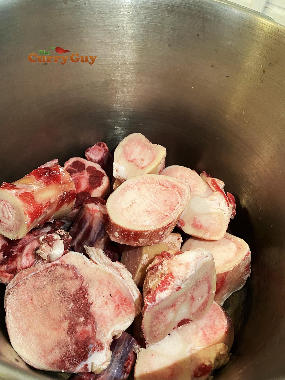 Bones and oxtail in pot