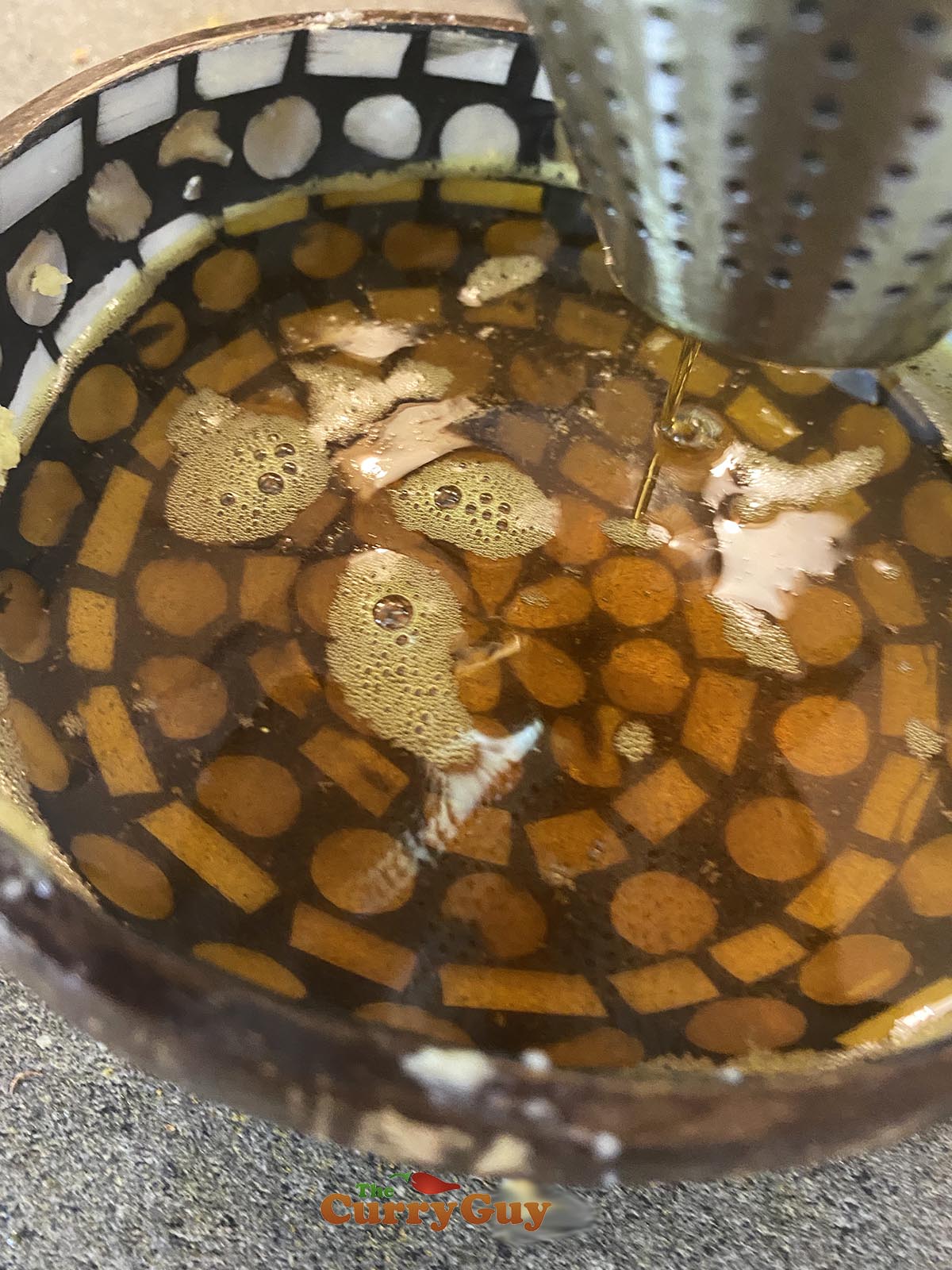 Straining niter kibbeh