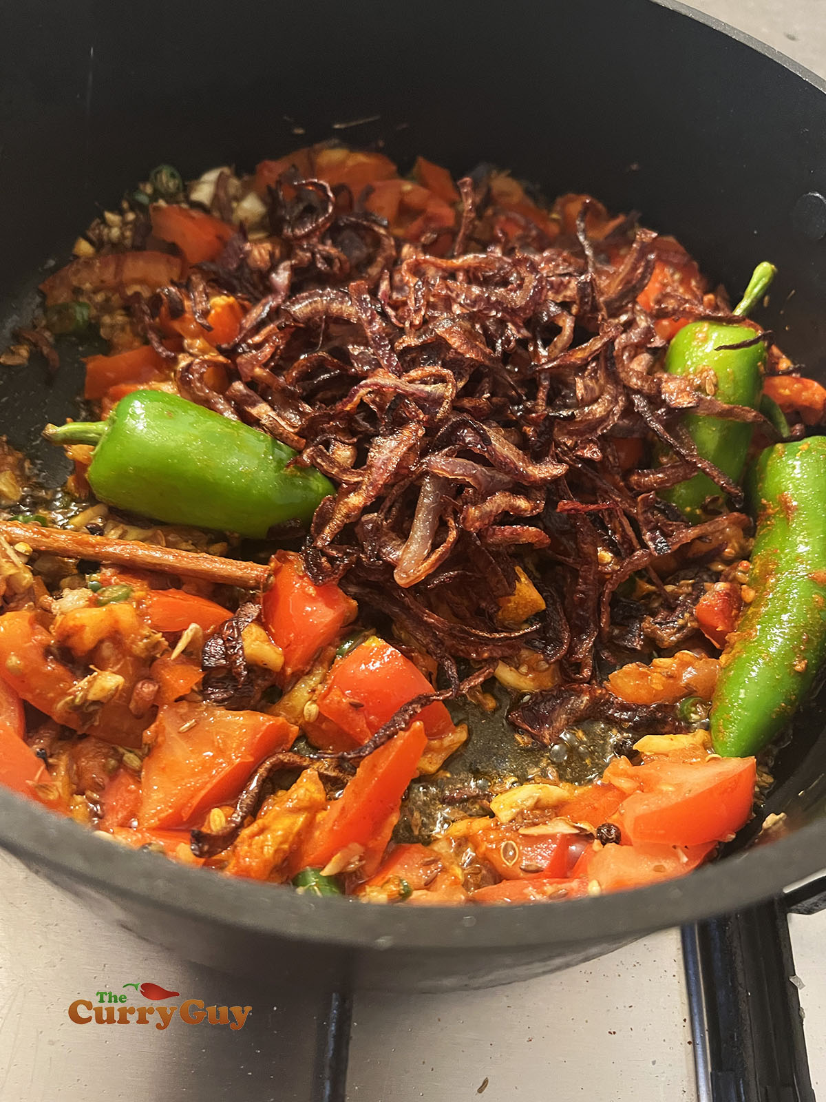 Adding onions to pan