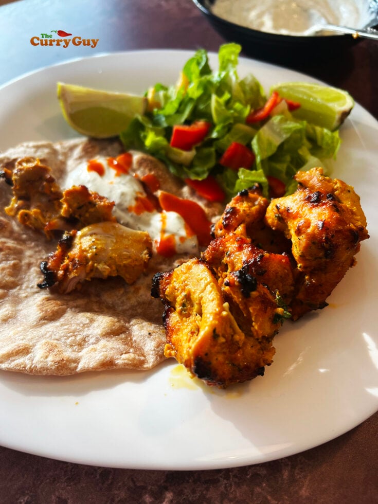 Serving chicken kebabs