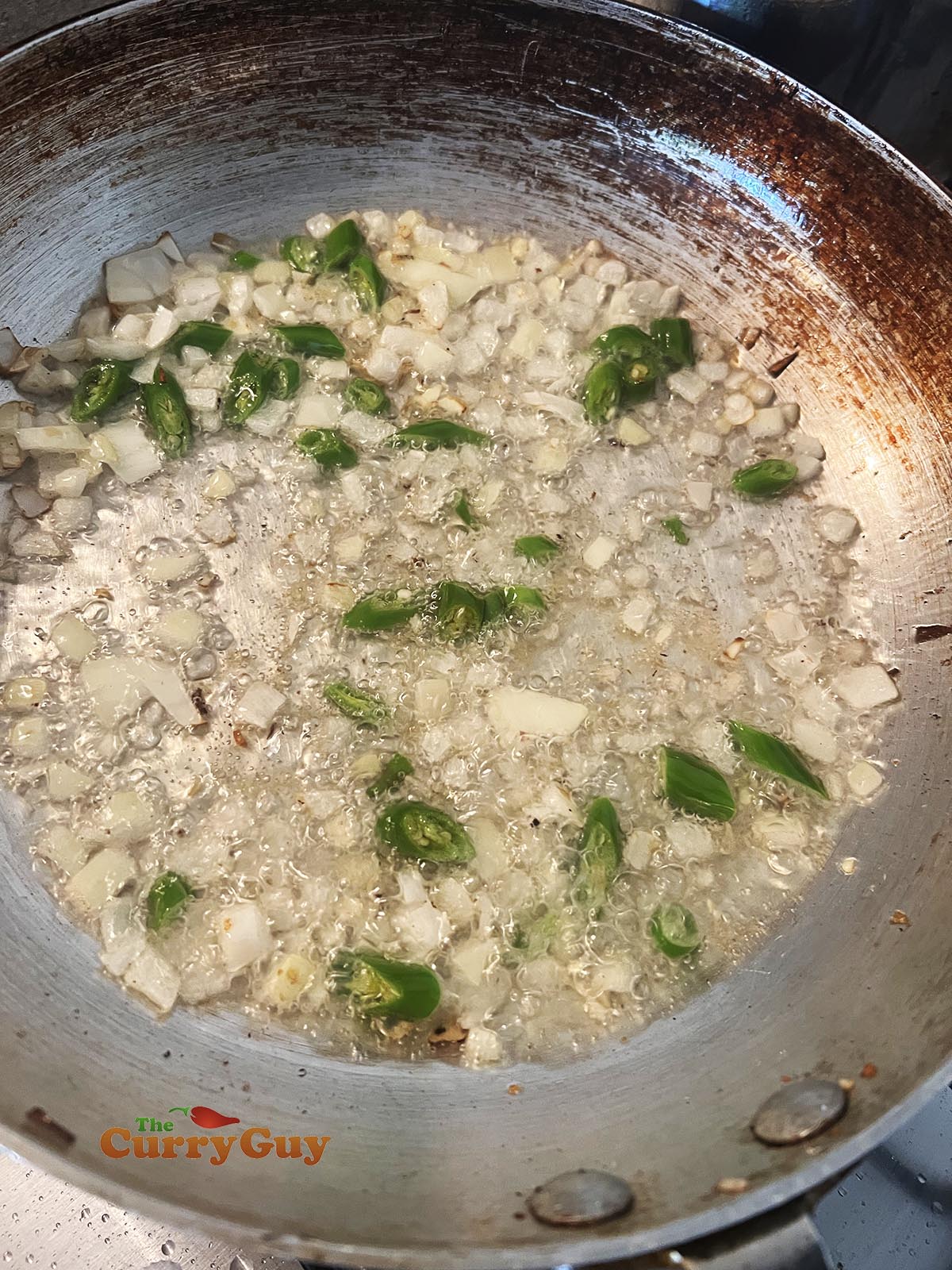 Frying onions and chillies