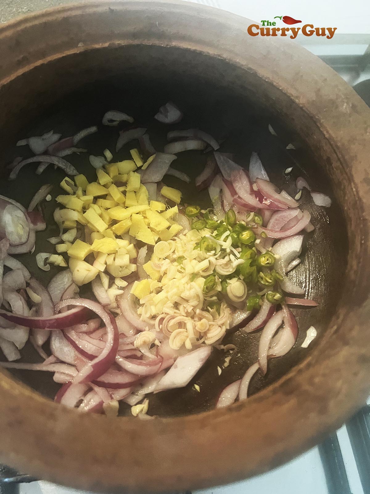Heating the base ingredients for the curry