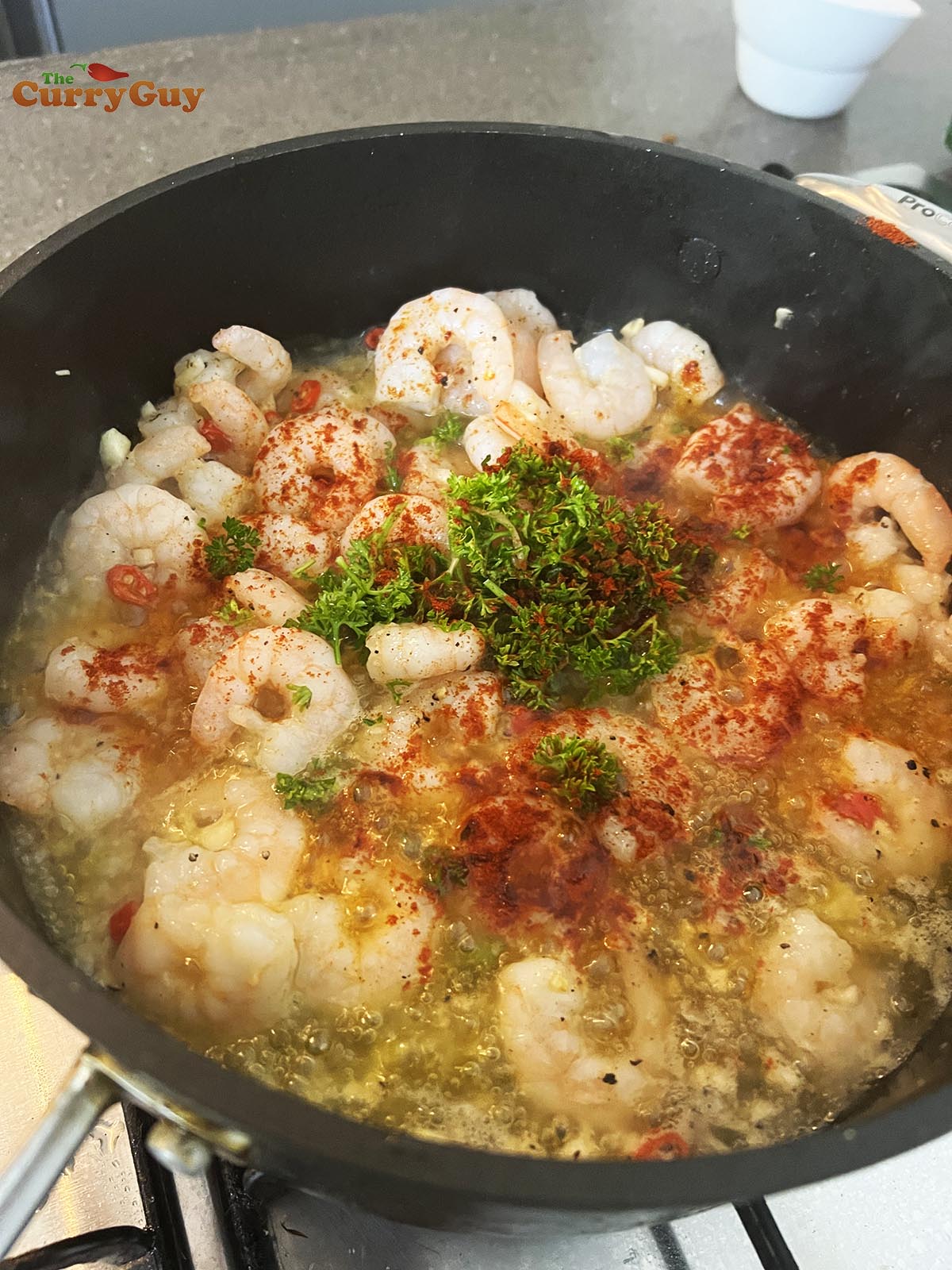 Frying all the pil pil ingredients