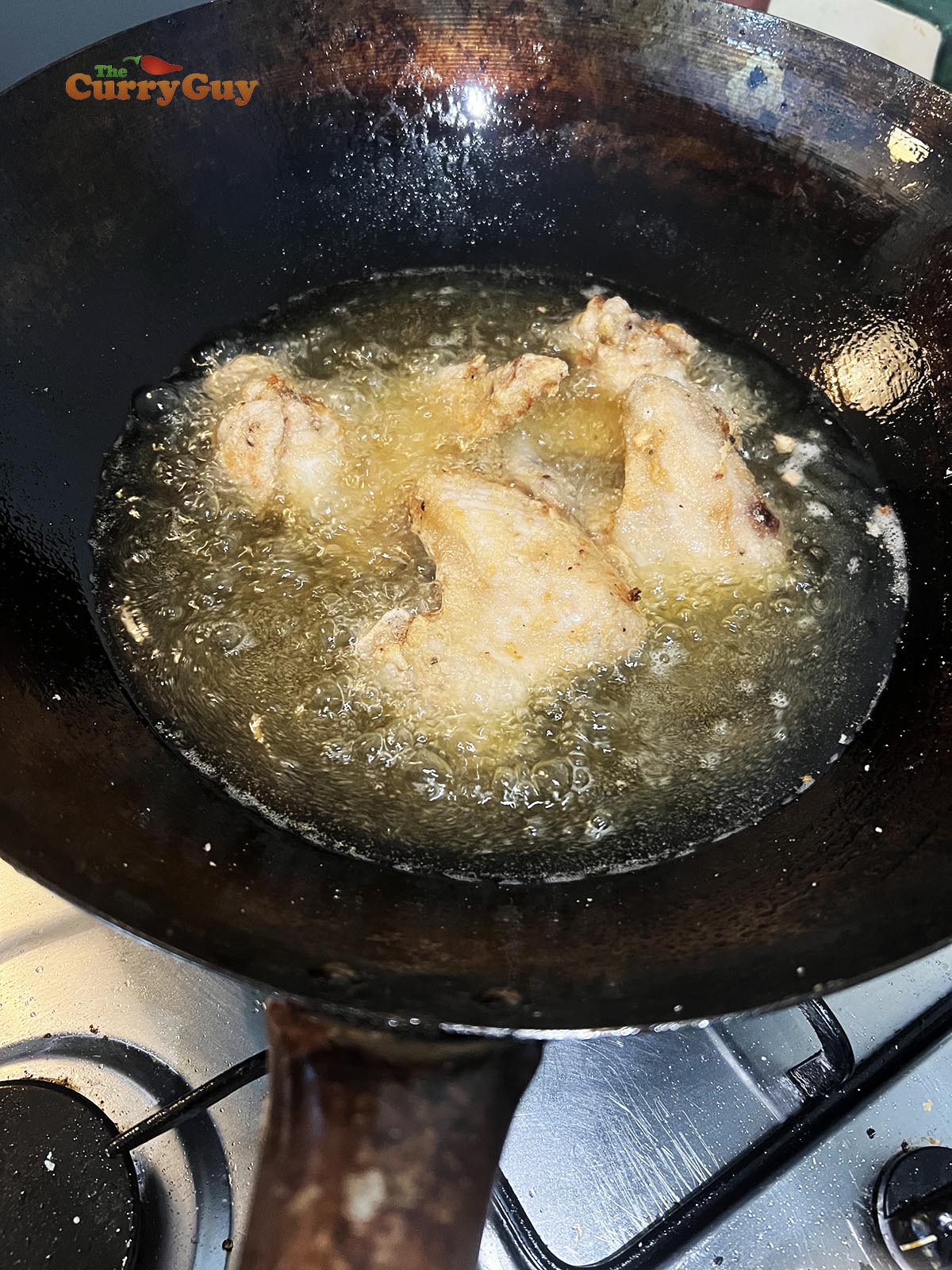 Frying chicken wings