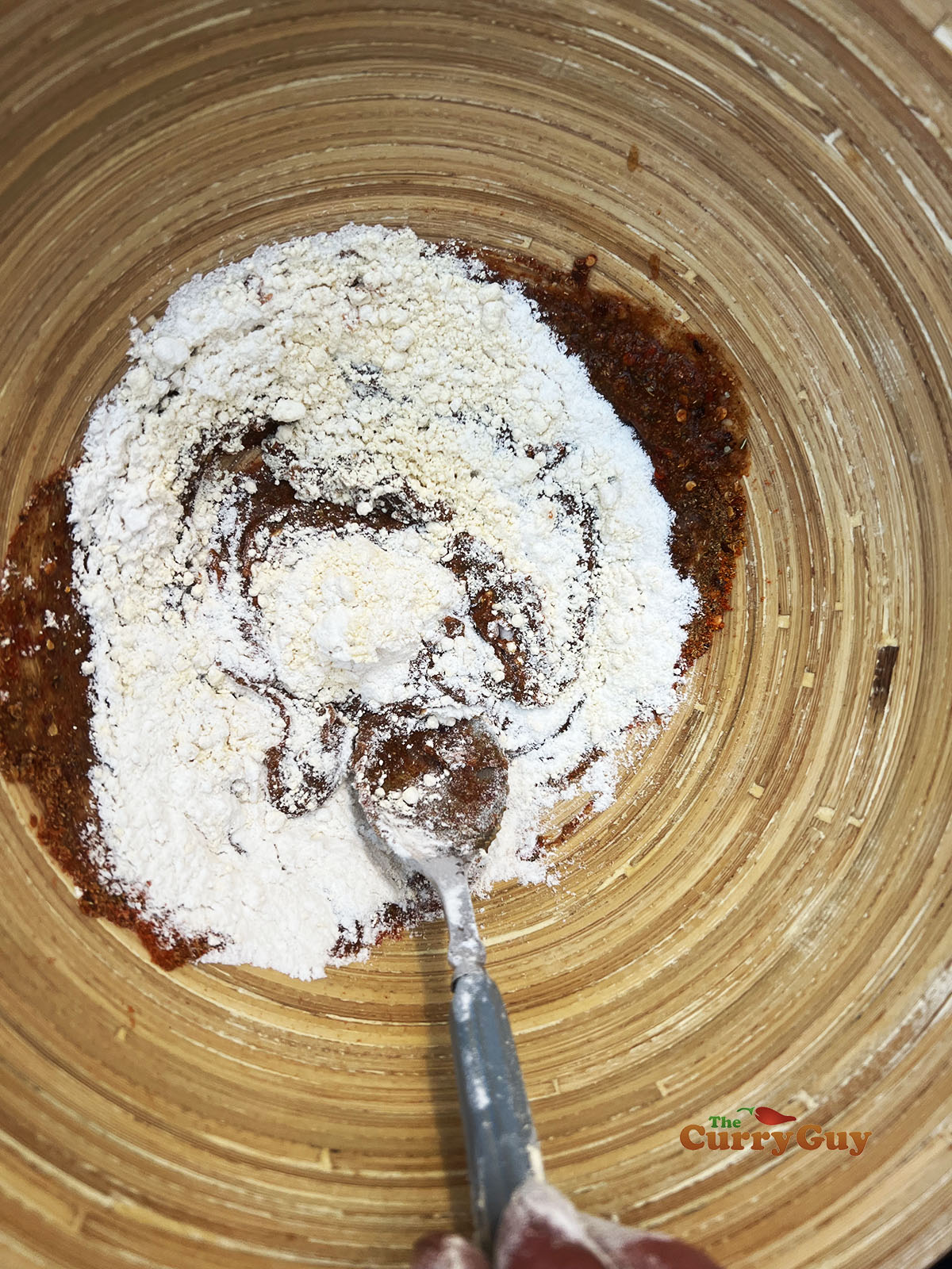 Adding flours to the bowl