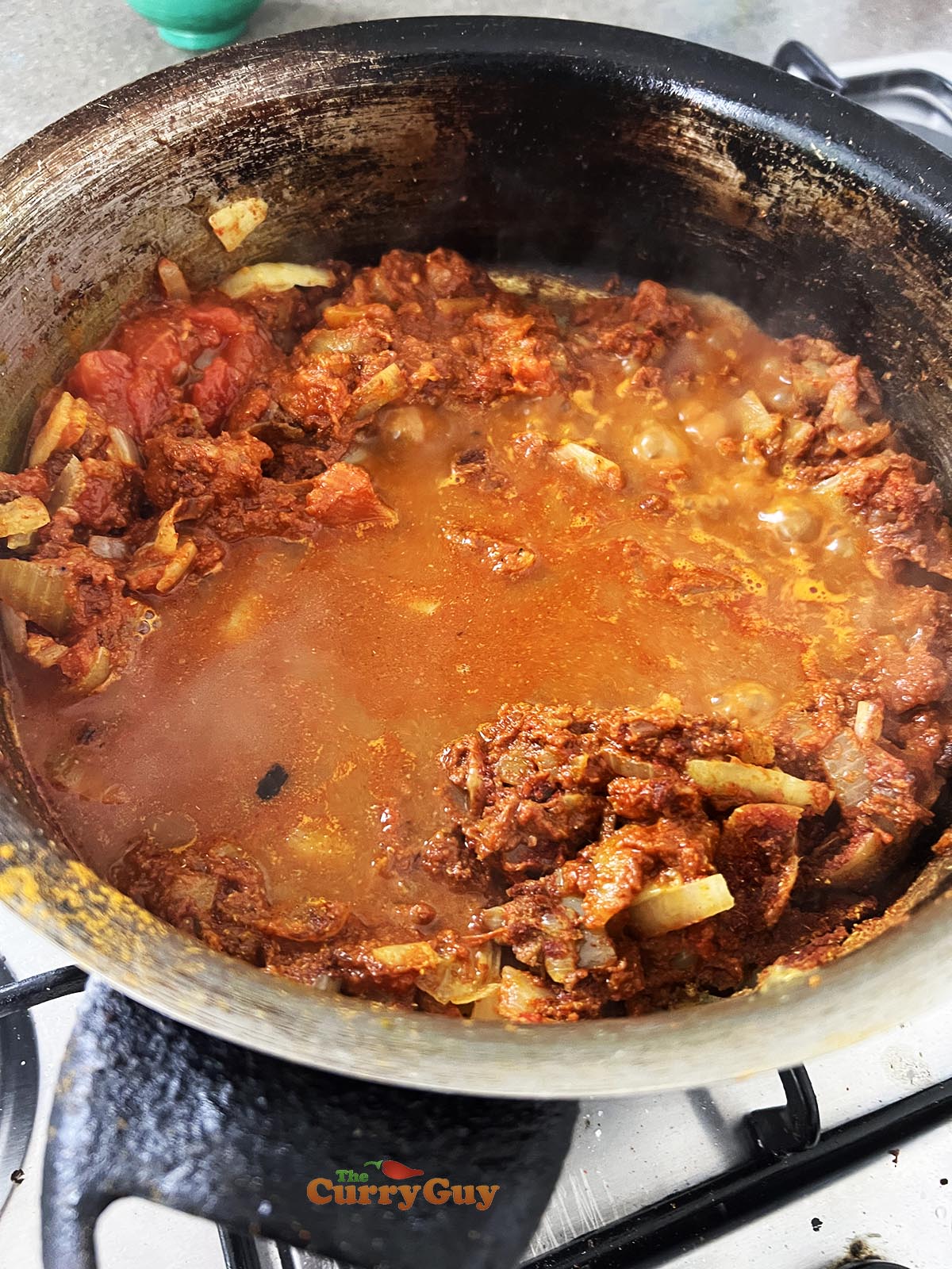 Simmering sauce in the pan