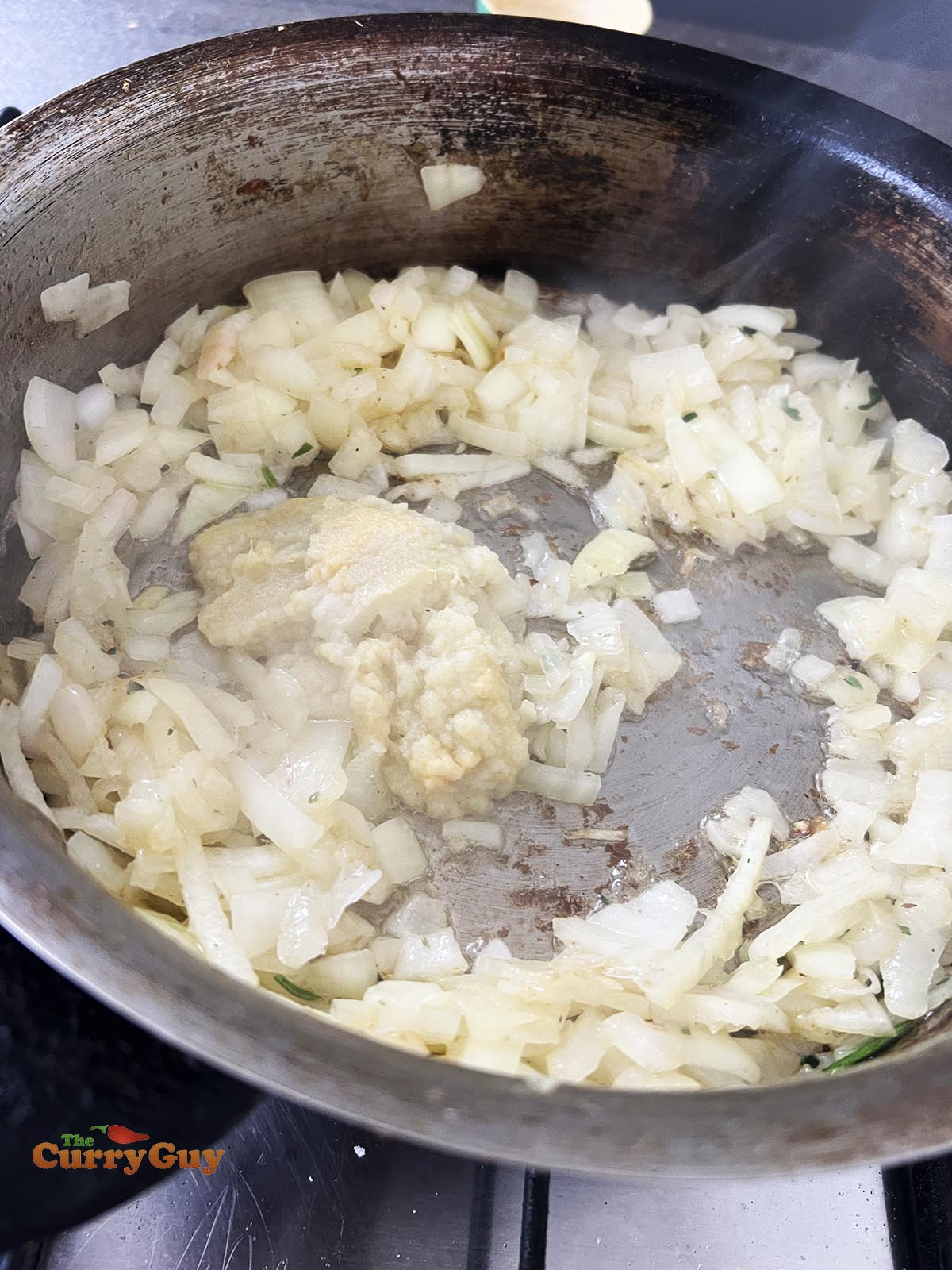 Adding ground spices to the pan
