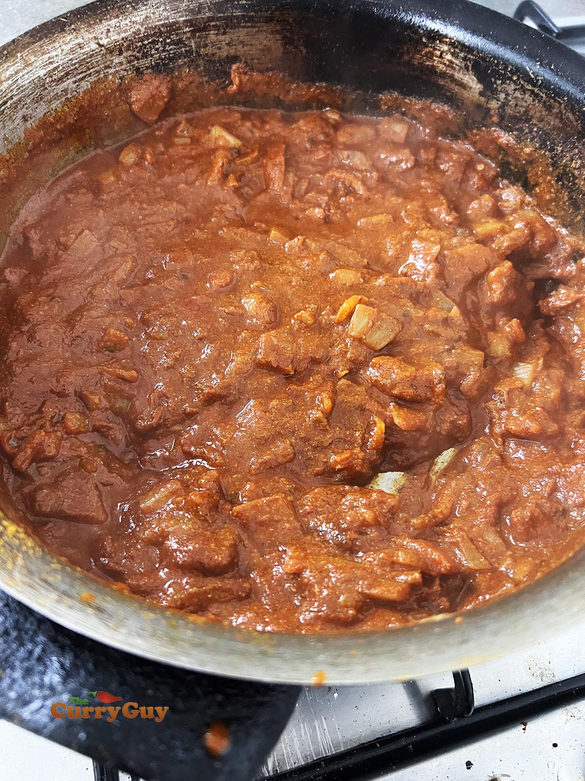 Simmering the sauce before blending