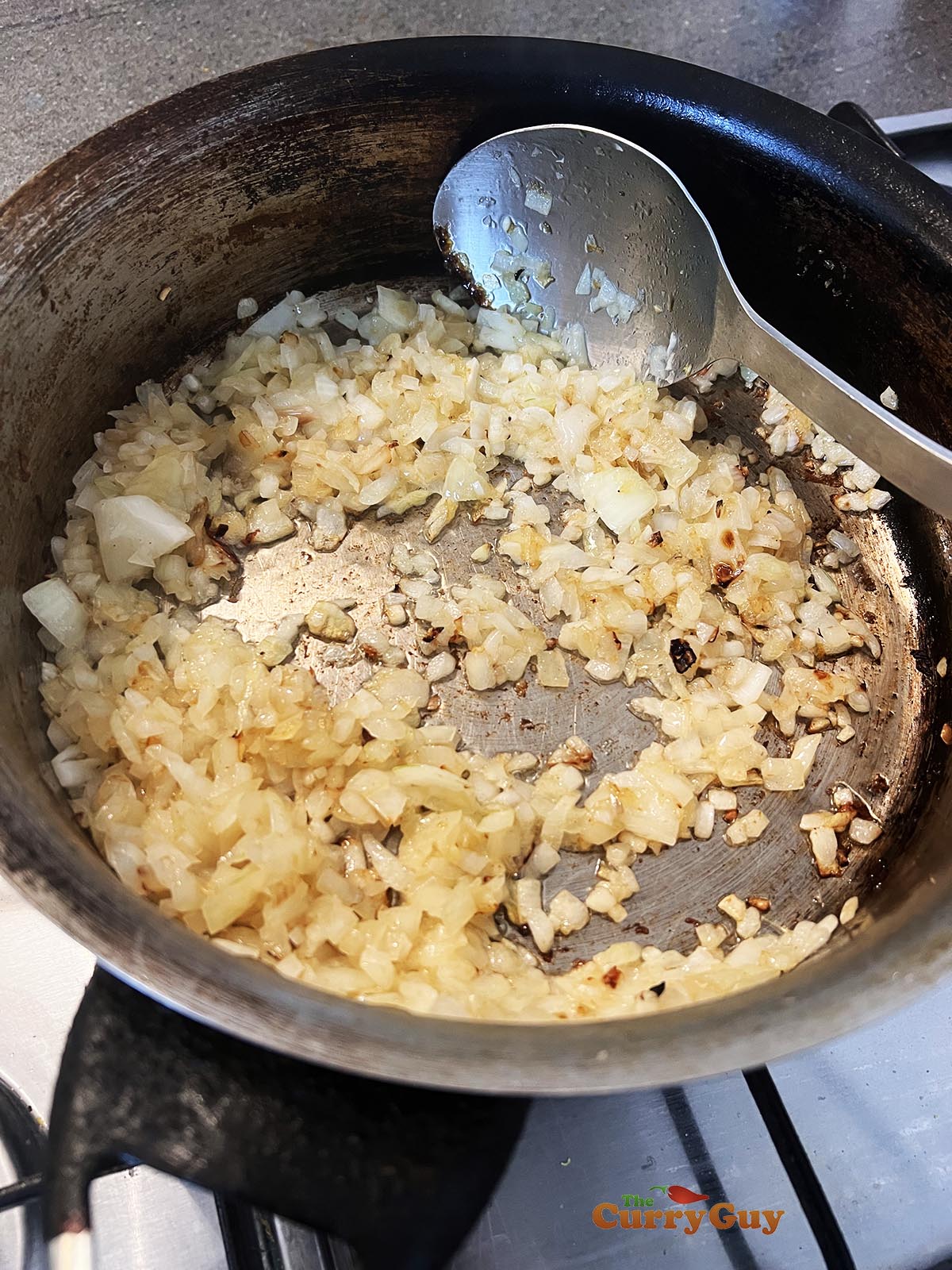 Frying onions in pan