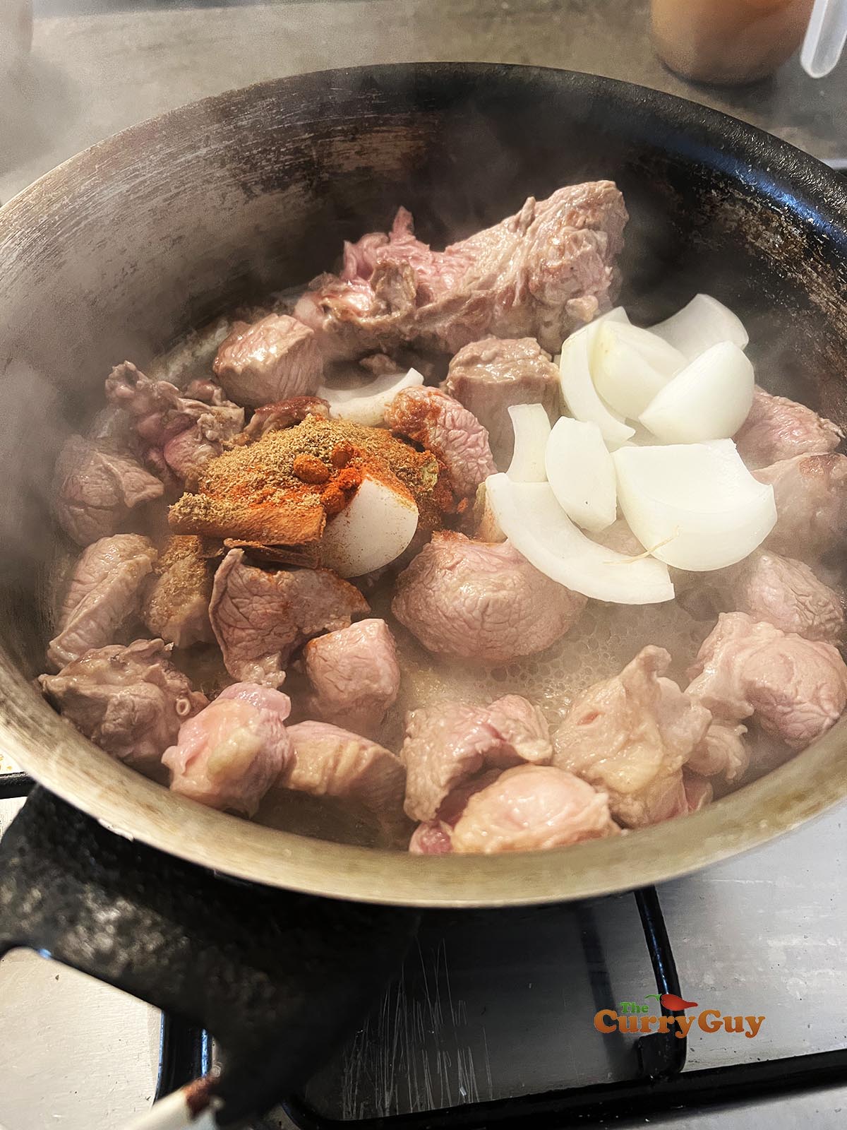 Cooking lamb in pan