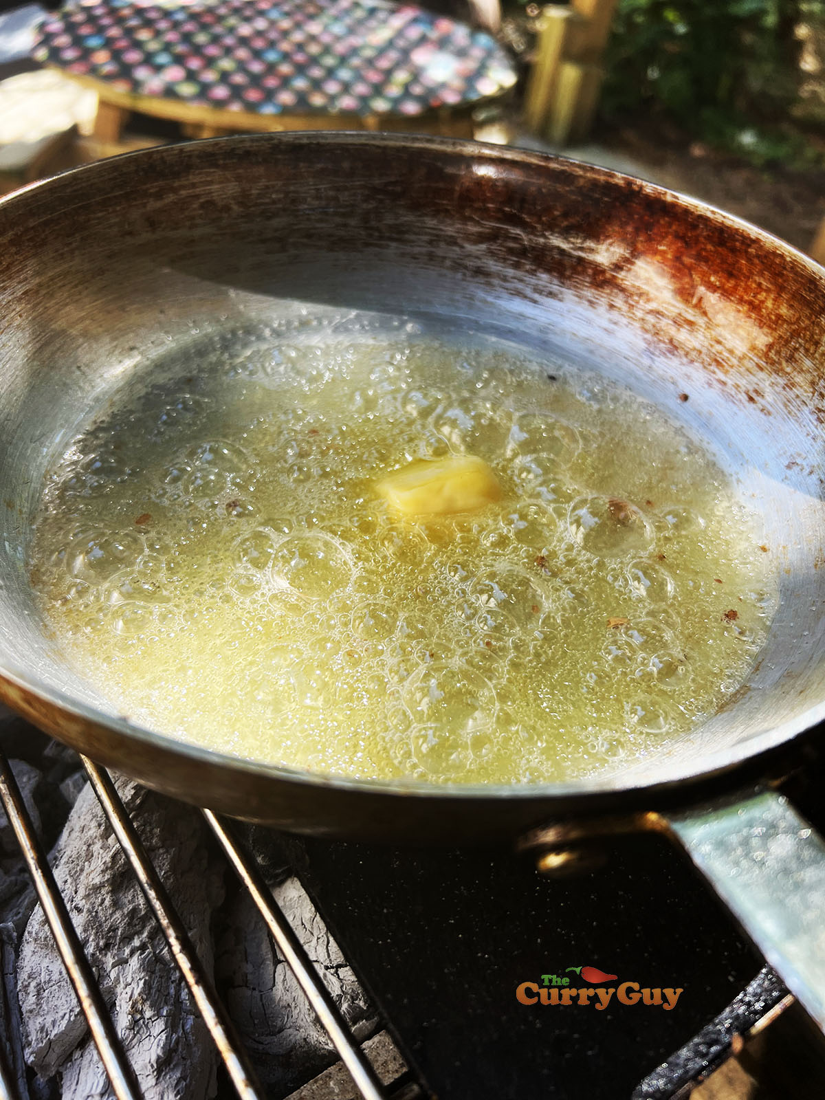 Oil simmering over the fire