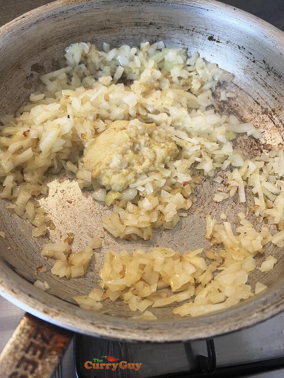 Frying onions, garlic and ginger