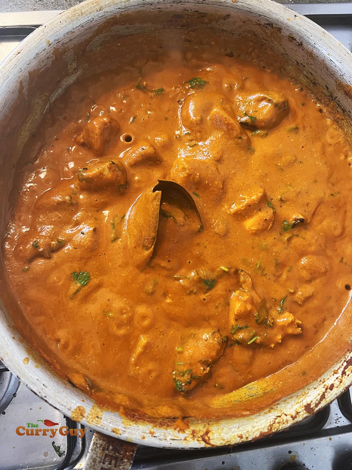 Finishing the chicken vindaloo from scratch