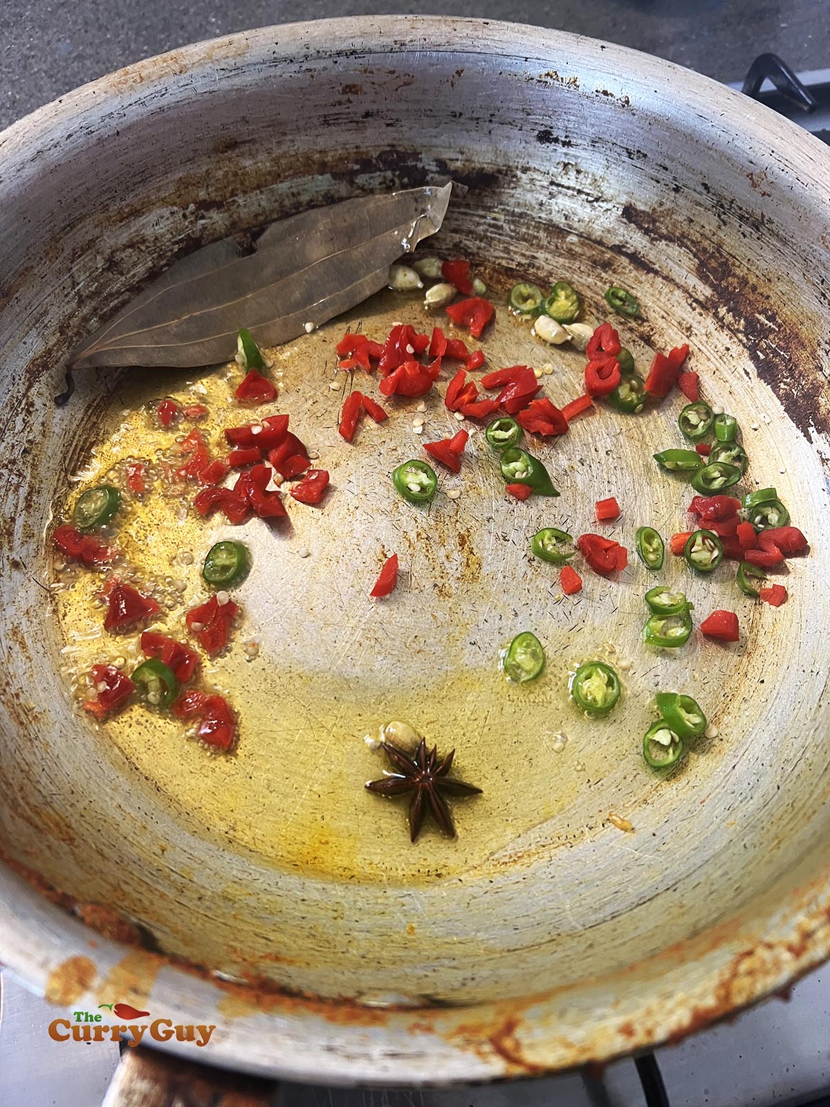 Adding blended sauce to the pan