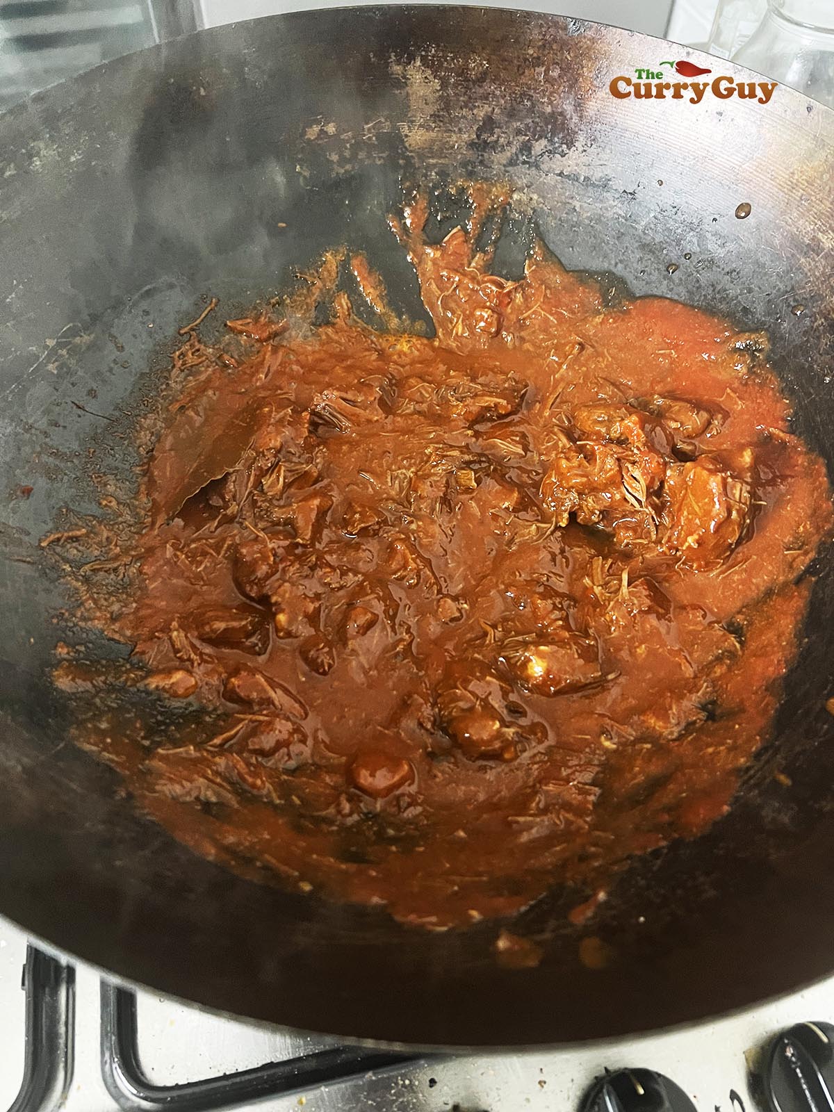 Simmering birria de res