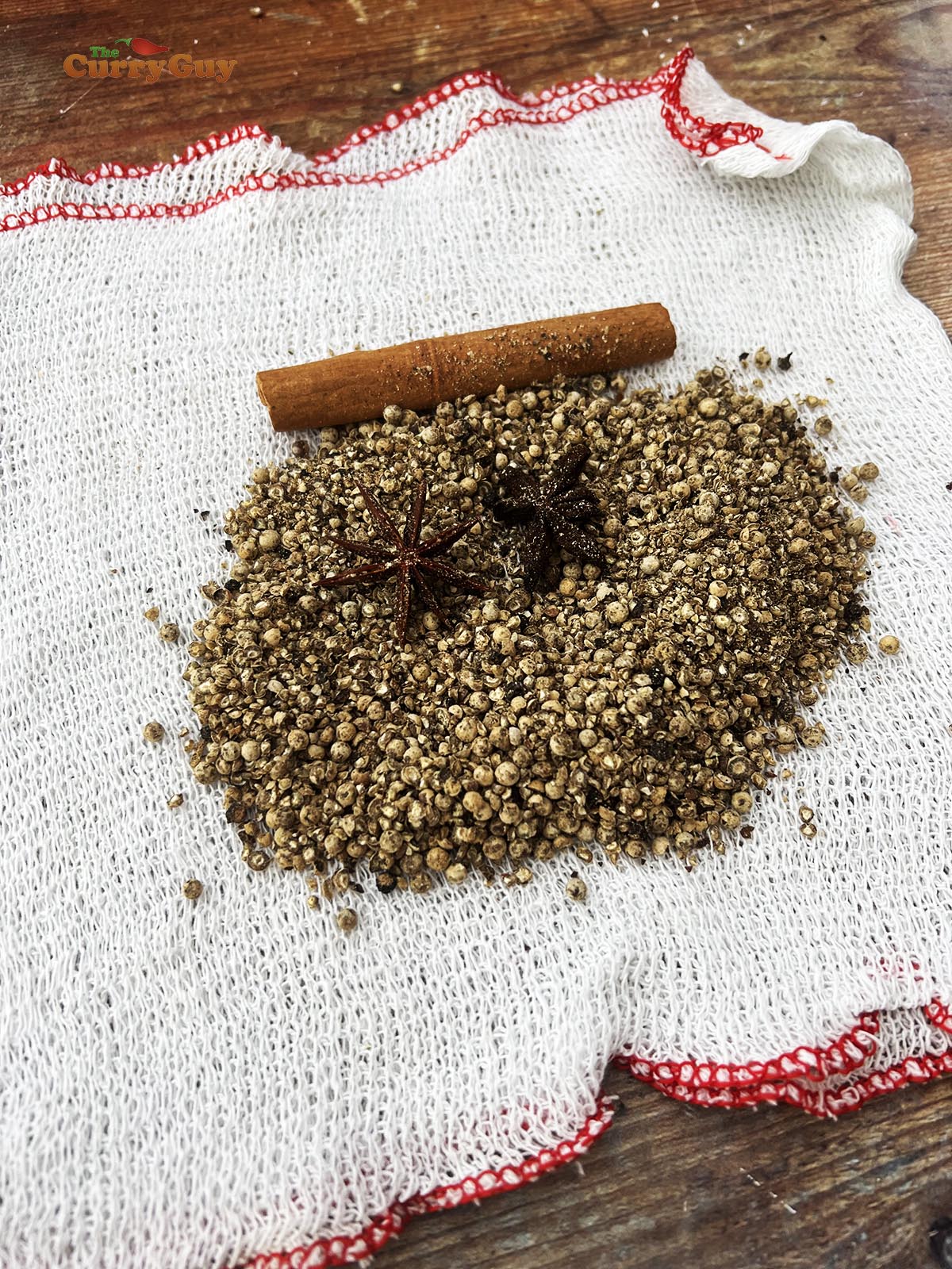 Making the spice pack for the broth.