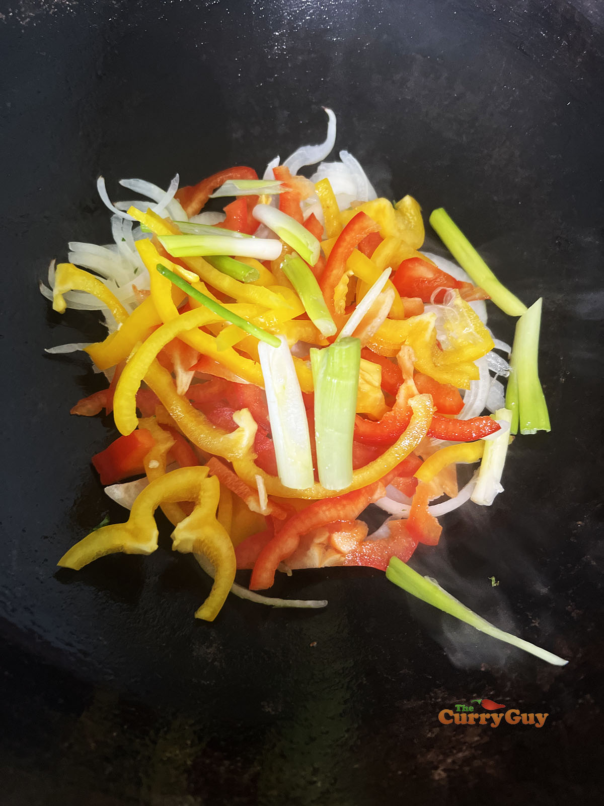 Veggies beginning to fry in the wok