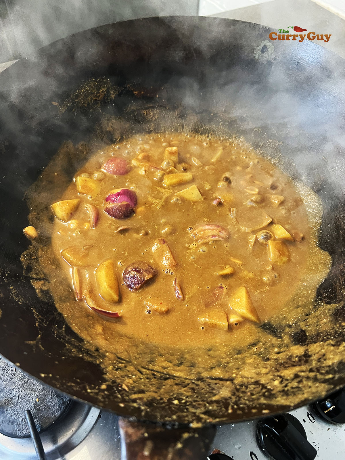 Simmering potatoes in stock