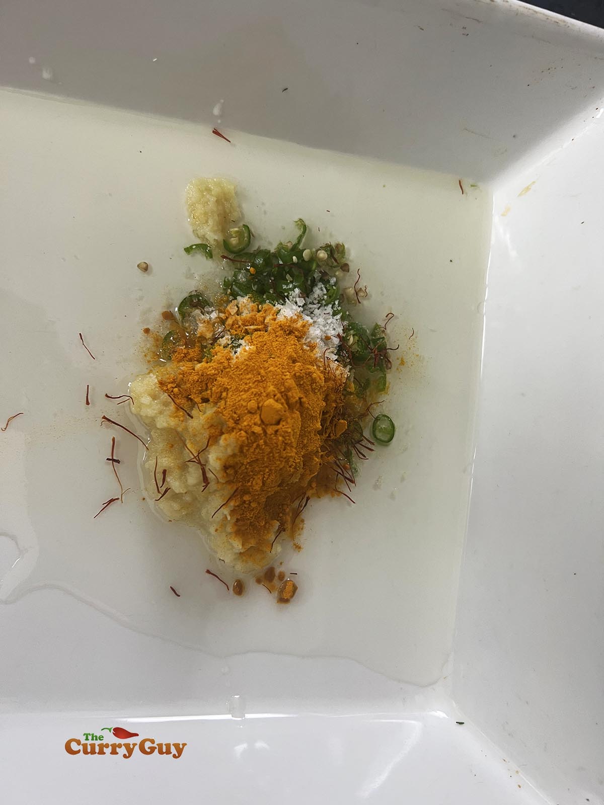 Preparing first marinade for malai chicken