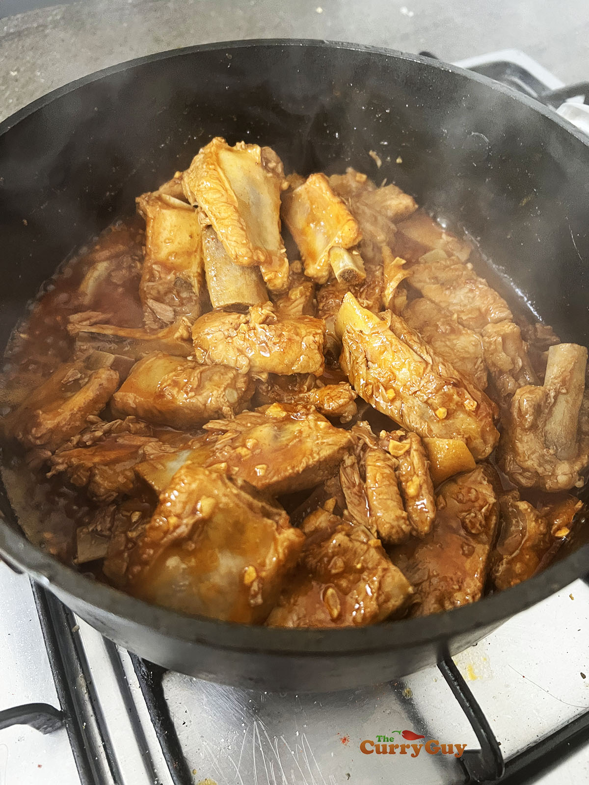 Chopped garlic oil added to the ribs