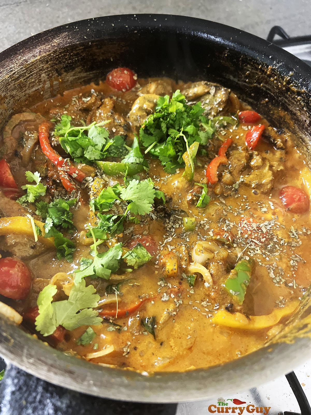 Adding kasoori methi and chopped coriander