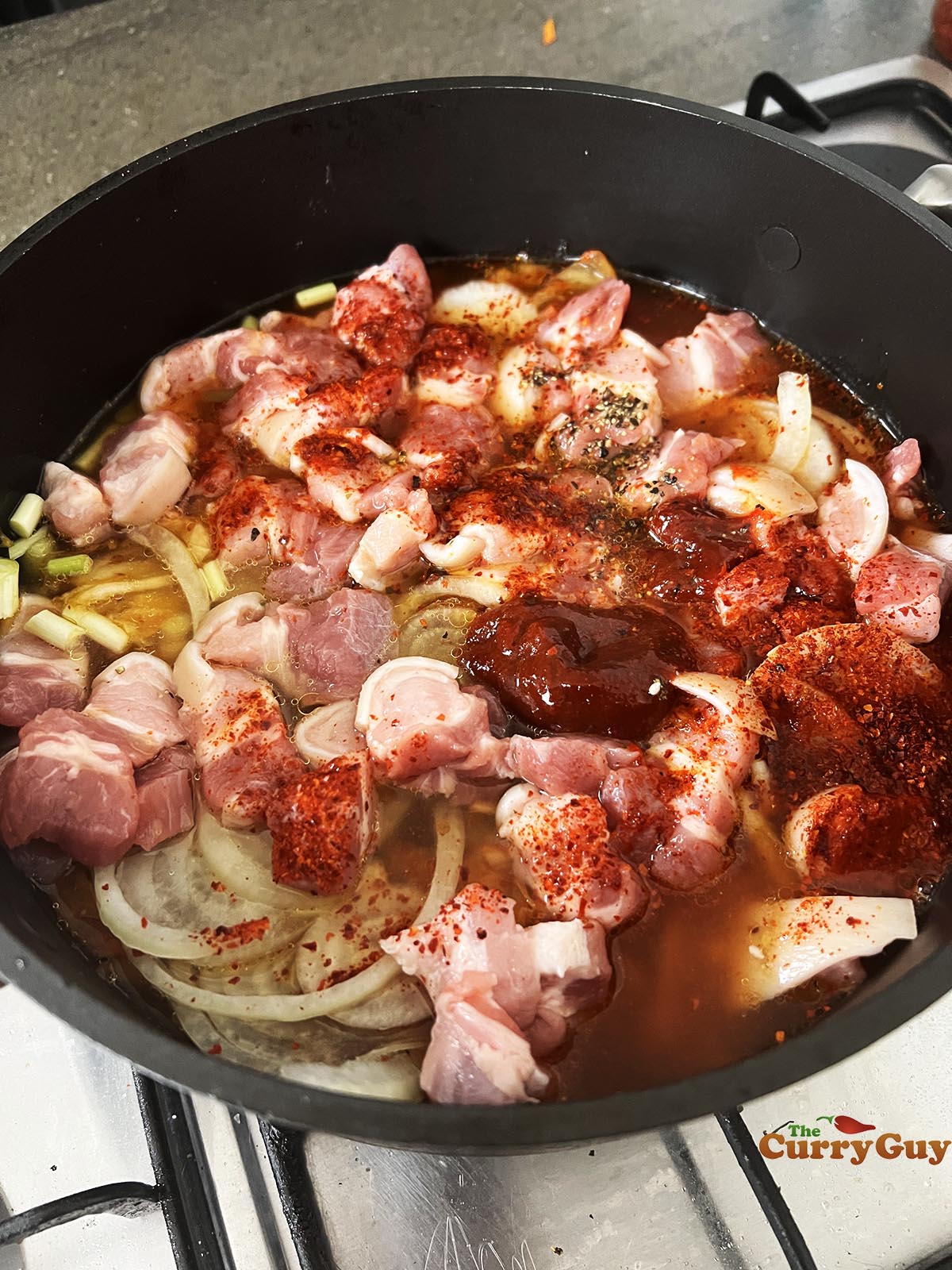 Adding remaining ingredients to the pot