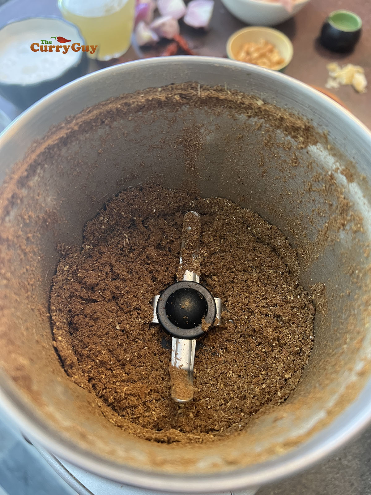 Grinding the roasted spices to a powder