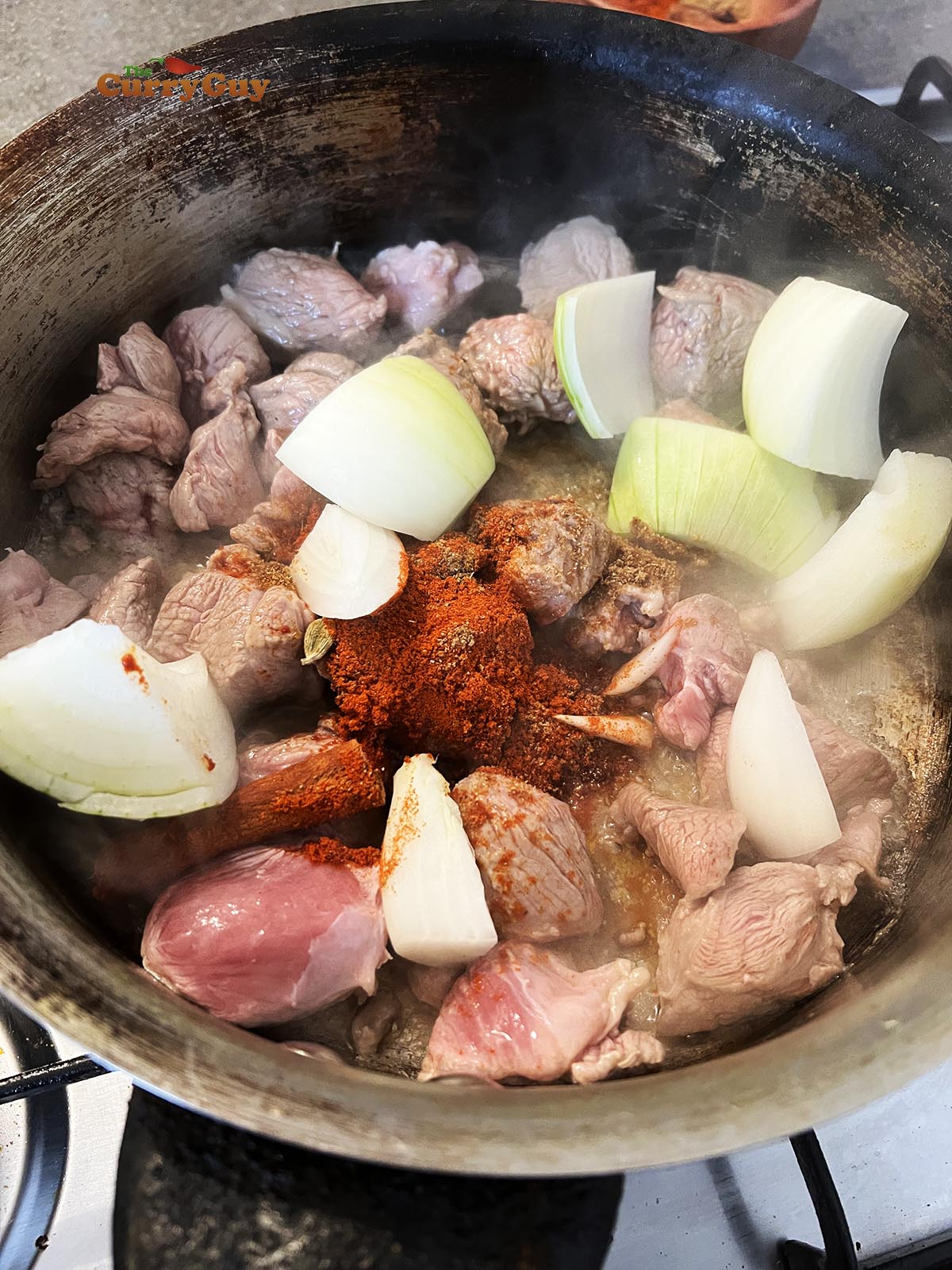 Browing meat for the lamb saag