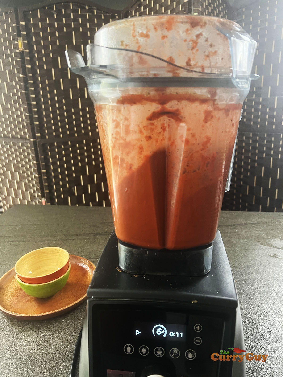 Blending the pork pibil marinade.